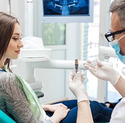 a dentist in Marietta explaining how dental implants can fail